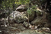 Kbal Spean, along the path in the jungle passing by some interesting rocky formations 